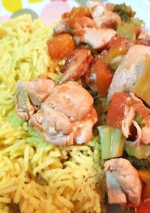 A picture of Papaya Chicken with Turmeric Rice.