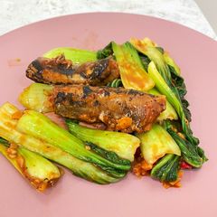 A picture of Stir-fried Bok Choy with mackerel in tomato sauce.