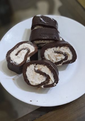 Una foto de Rollito de chocolate con queso crema