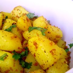 A picture of Cumin Turmeric Pan Fried Potato Cubes.