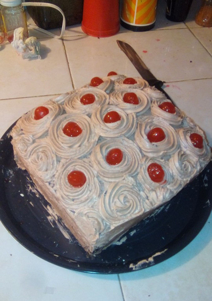 Una foto de Pastel de chocolate y betún de cafe