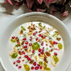 A picture of Colourful fruits raita.