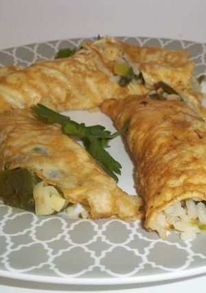 Foto principal de Tortillas rellenas de arroz y pimientos verdes