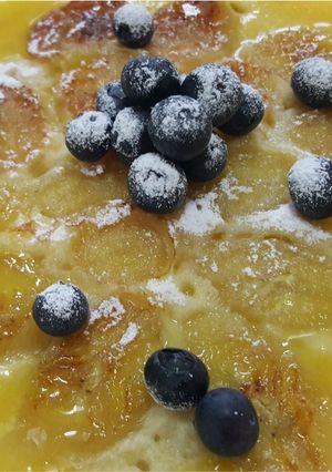 A picture of Pancake with orange sauce.