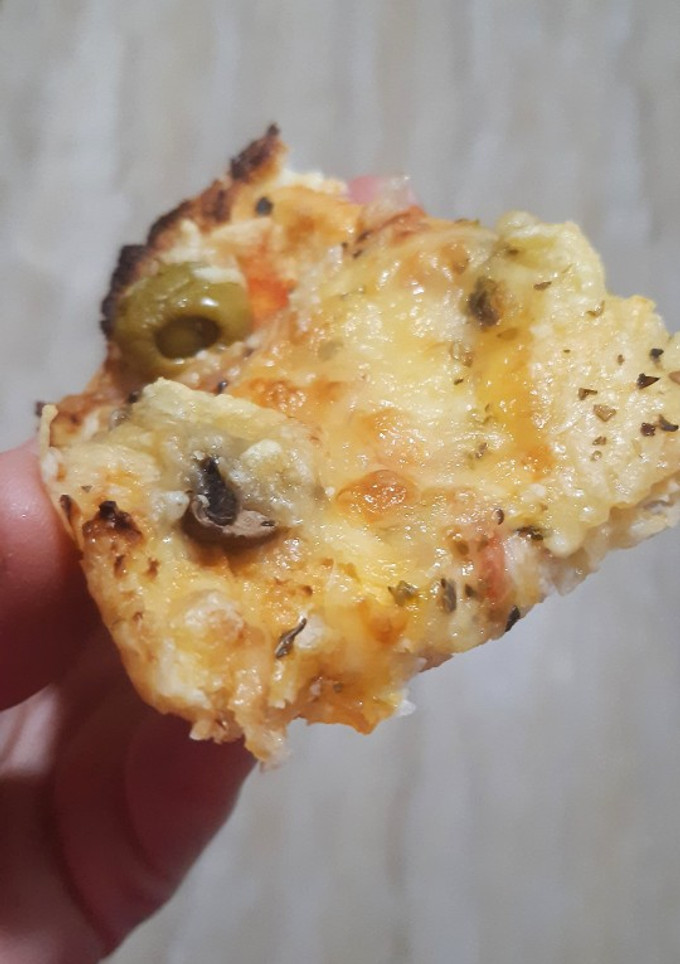 Una foto de Pizza con base de coliflor