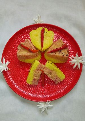 A picture of Two layered muffin khaman.