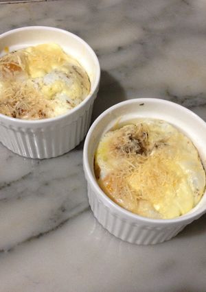 A picture of Baked Eggs with Spinach and Parmesan.