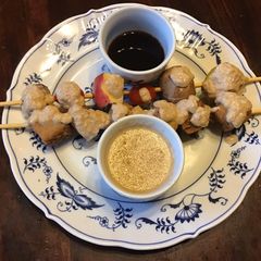 A picture of California Farm Skewered Tofu in Peanut Sauce.