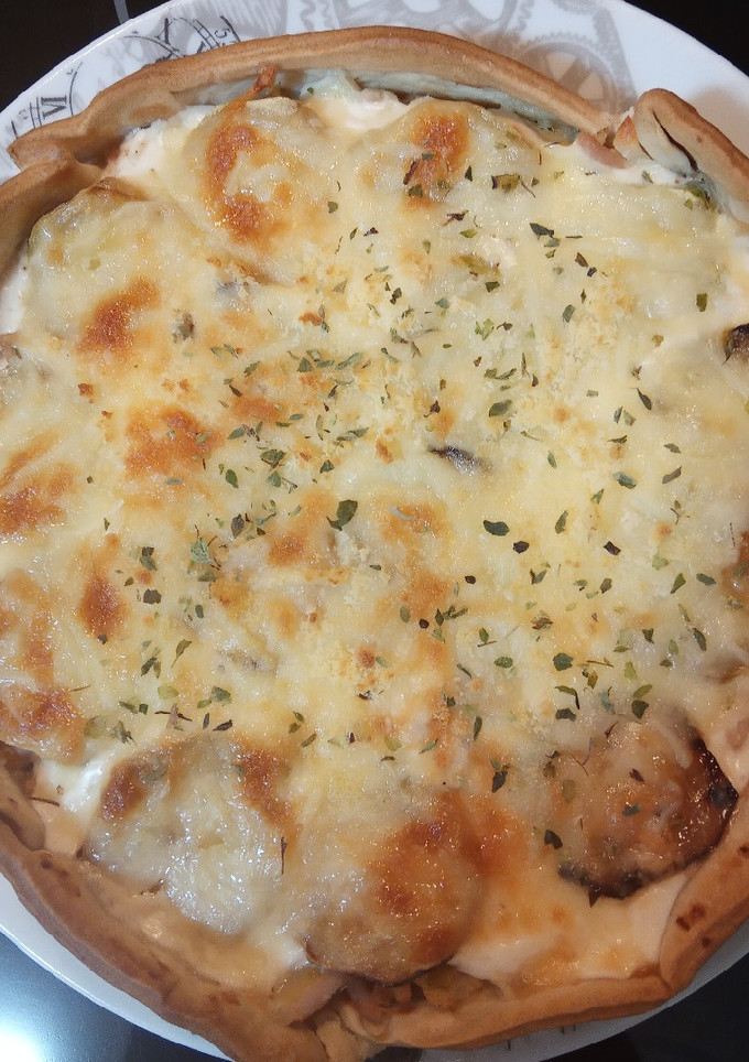 Una foto de Pastel de carne con calabacín y masa quebrada