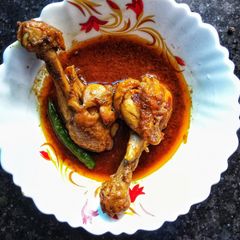 A picture of Tomato Chicken Curry.