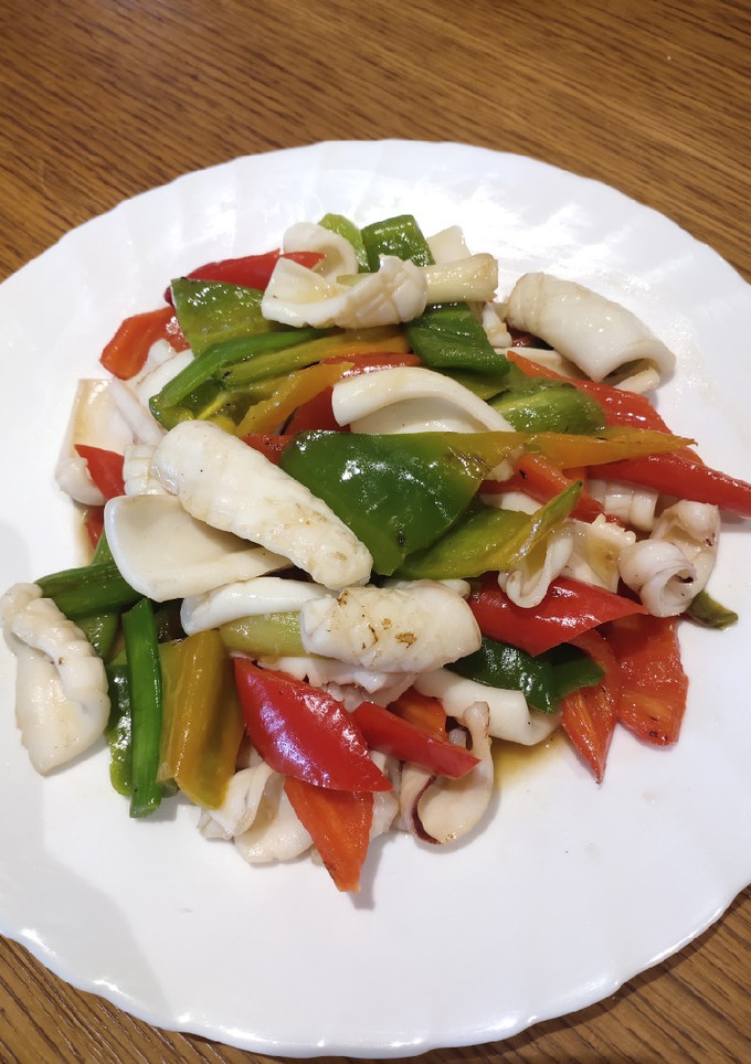 A picture of Squid with Red and Green Chillies.