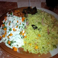 Fried rice and coleslaw and beef A picture of Fried rice and coleslaw and beef.