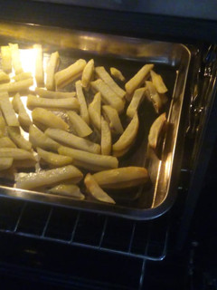 Una foto de Papas fritas al horno