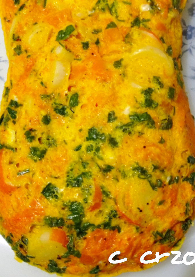 Una foto de Tortilla de calabaza y palitos de cangrejo en microondas