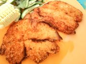 Una foto de milanesas de pollo crujientes