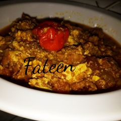 A picture of Egg and minced meat sauce.