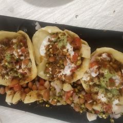 A picture of Chana& sprouts moong chaat katori.