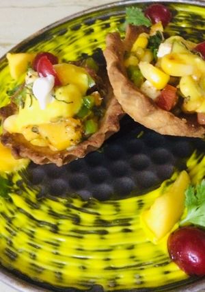 A picture of Mango salsa tart.