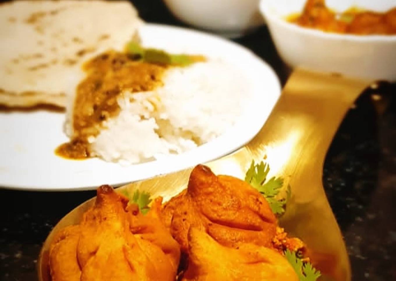 Modak Aamti with Rice and Jowar roti