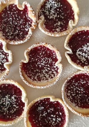A picture of Easy peasy raspberry tarts.