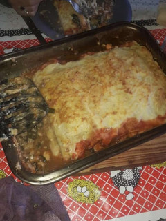 Una foto de Canelones con salsa Blanca