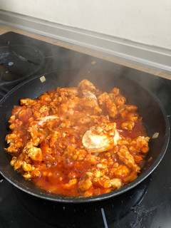 Una foto de Boloñesa de pollo y queso de cabra