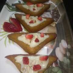 A picture of Shahi tukda with strawberry.