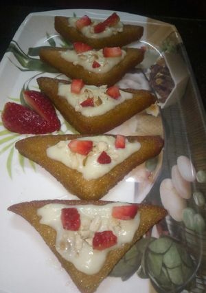 A picture of Shahi tukda with strawberry.