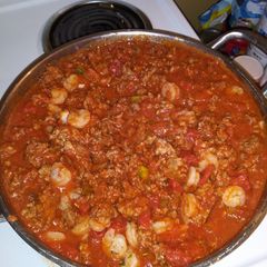A picture of Shrimp and italian sausage spaghetti.