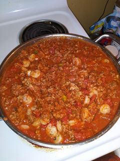 A picture of Shrimp and italian sausage spaghetti.