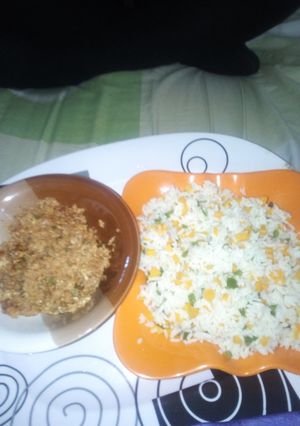 A picture of Vegetable Rice With Egg Sause.