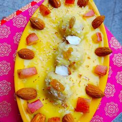A picture of Fruits Balls in Custard.