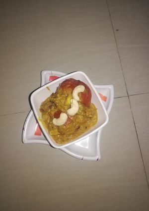 A picture of Stuffed tomato curry.