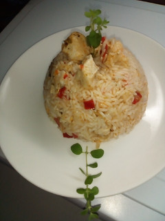 Una foto de Arroz con pollo 🐣🐤🐥🐔❣️💜❣️