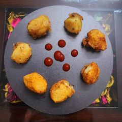 A picture of Cornflour breaded baby potatoes.