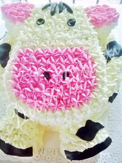 Una foto de Torta Fácil con manga "La vaca Lola"