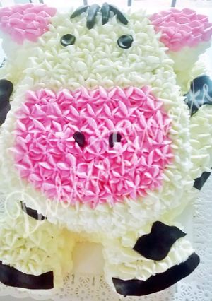 Una foto de Torta Fácil con manga "La vaca Lola"