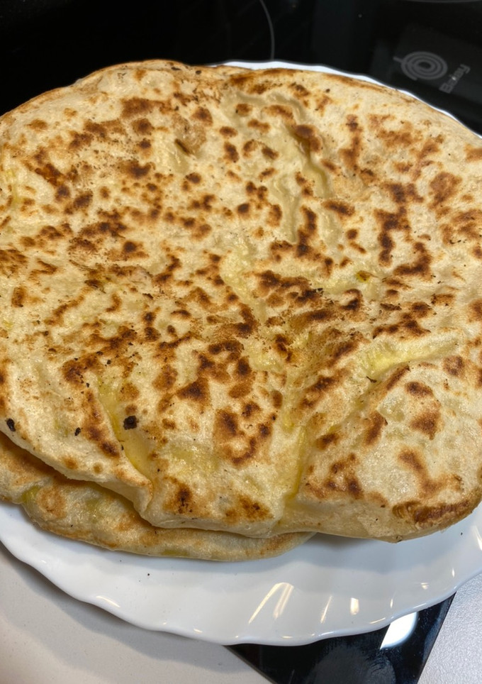 Una foto de Naan de queso (mambo)