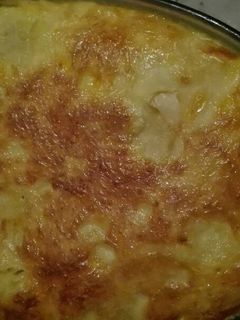 Una foto de Pastel de patatas relleno de beicon lonchas de queso Jamón York