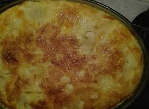 Foto principal de Pastel de patatas relleno de beicon lonchas de queso Jamón York
