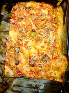 Una foto de Tamal de Maíz Nuevo, Gallina & Pescado