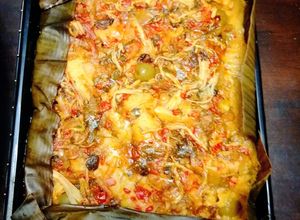 Una foto de Tamal de Maíz Nuevo, Gallina & Pescado