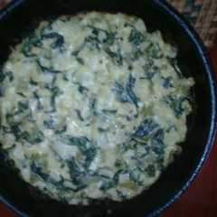 A picture of Tortilla de choclo blanco (seco) cremoso y acelga.