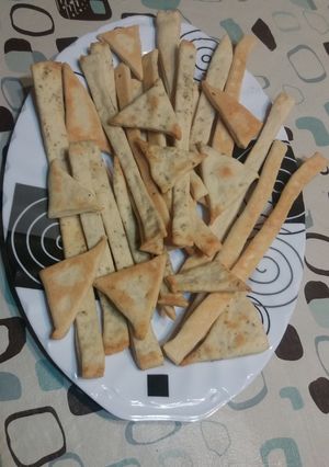Una foto de Talitas de orégano o queso. Snack vegano