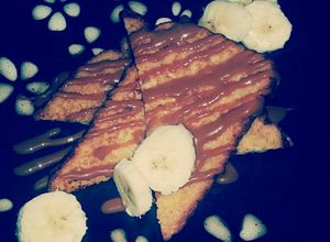 Una foto de Pan Francés con Dulce de Leche y Plátano :)