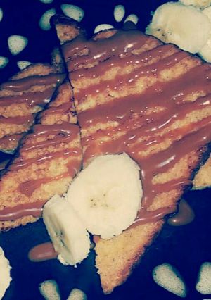 Una foto de Pan Francés con Dulce de Leche y Plátano :)