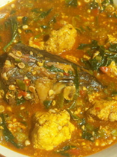 A picture of Lumps of egusi in okra and ogbono soup.