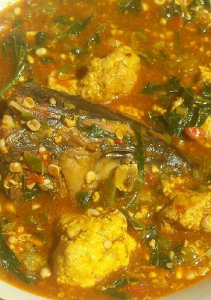 A picture of Lumps of egusi in okra and ogbono soup.
