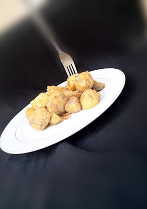 A picture of Fried potato and Egg.