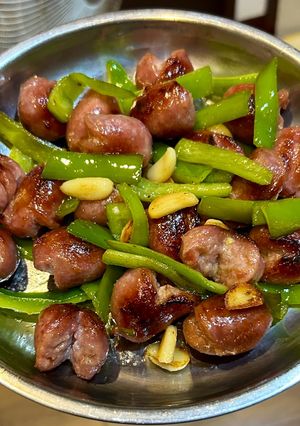 A picture of Stir-Fried Bell Peppers with Sausage.